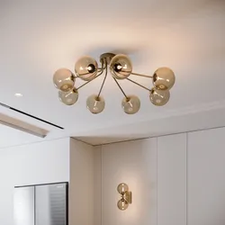 Lampadario da interno  88,4x80,8x28h cm in vetro soffiato champagne e metallo rifinito in ottone