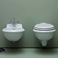Sanitari sospesi in ceramica serie JUBILAEUM di Azzurra con sedile copri wc design classico