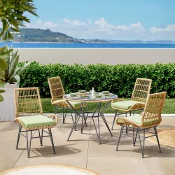 Set pranzo tavolo rotondo 90 cm top in vetro e 4 sedie in polyrattan nocciola con cuscini pistacchio - Banus