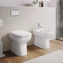 Sanitari in ceramica filomuro wc e bidet con copriwc modello Origin