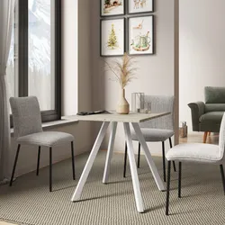 Tavolo da pranzo 90x70 cm con top effetto travertino e gambe in metallo bianco - Gilmore