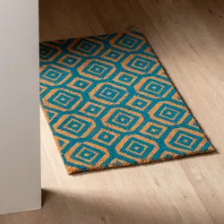 Zerbino 45x75 cm in coir con stampa disegno geometrico blu petrolio