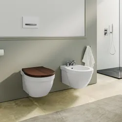 Coppia di sanitari sospesi in ceramica bianco con copriwc noce - Olimpo
