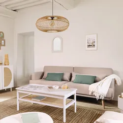 Divano letto 3 posti in tessuto beige con cuscini decorativi - Neill