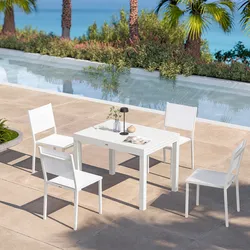 Set pranzo bianco con tavolo 105/210x75 cm e 4 sedie in textilene e alluminio - Carioca