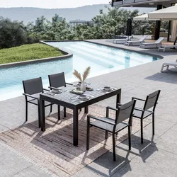 Set pranzo antracite con tavolo 135/270x90 cm e 4 sedie con braccioli textilene e alluminio - Carioca