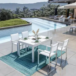 Set pranzo bianco con tavolo 135/270x90 cm e 4 sedie con braccioli textilene e alluminio - Carioca