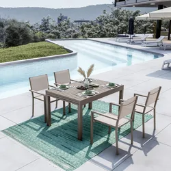 Set pranzo tortora con tavolo 135/270x90 cm e 4 sedie con braccioli textilene e alluminio - Carioca