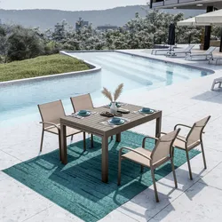 Set pranzo tortora con tavolo 135/270x90 cm e 4 sedie con braccioli tondi textilene e alluminio - Carioca