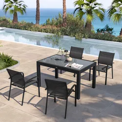 Set pranzo antracite con tavolo 135/270x90 cm top vetro e 4 sedie con braccioli tondi textilene e alluminio - Carioca