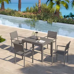 Set pranzo tortora con tavolo 105/210x75 cm e 4 sedie con braccioli in alluminio a doghe - Carioca