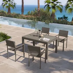 Set pranzo tortora con tavolo 135/270x90 cm top vetro e 4 sedie con braccioli in alluminio a doghe - Carioca