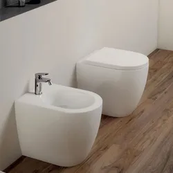 Coppia di sanitari Azzurra Comoda filomuro vaso + bidet + sedile copriwc