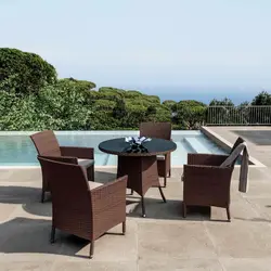 Set pranzo tavolo rotondo 90 cm e 4 poltrone polyrattan marrone con cuscini bianchi - Capri