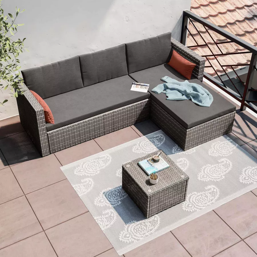 Set relax da giardino in polyrattan grigio con divano e tavolino