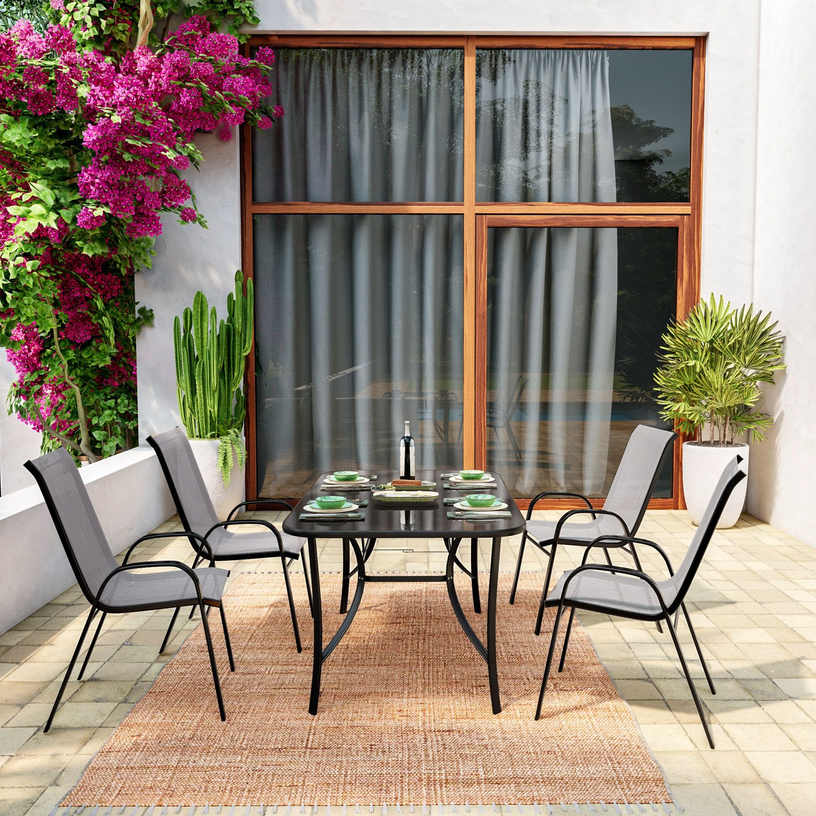 Set pranzo tavolo con top in vetro 150x90 cm e 4 sedie con braccioli in  acciaio nero e textilene grigio - Ninfa