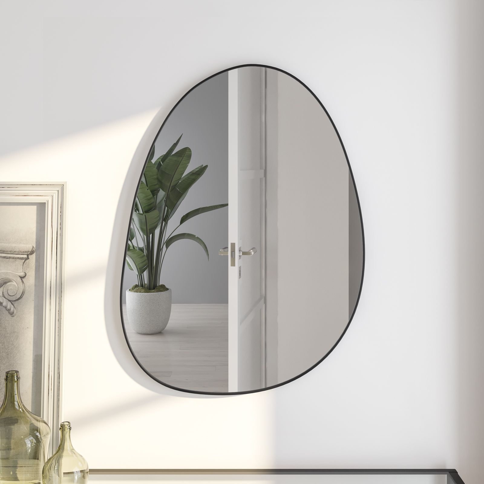 Specchio da parete irregolare reversibile 55x75h cm con cornice in metallo  nero - Stitch